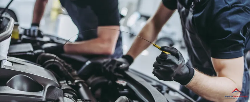 ADAG - Mechanics repairing a car