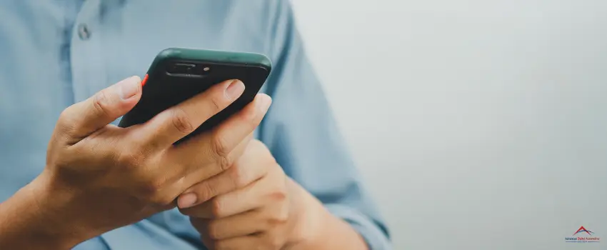 A hand holding a smartphones. Mobile Phone Search.