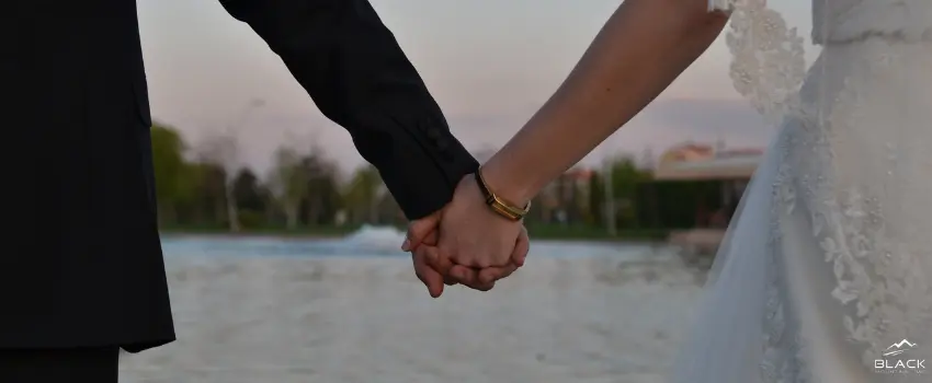 Bride and Groom holding hands