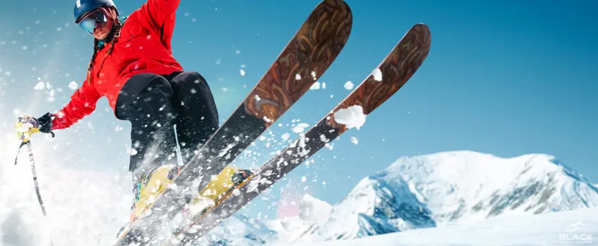 Man Wearing Red Jacket Skiing