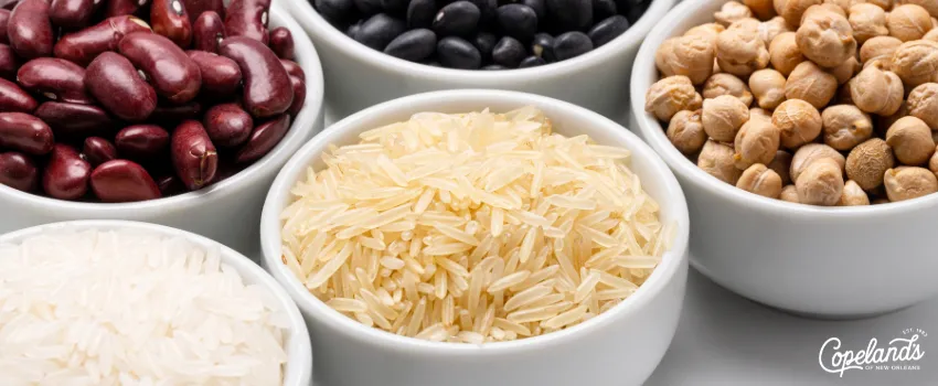 COD - Bowls of rice and beans ingredients on a table